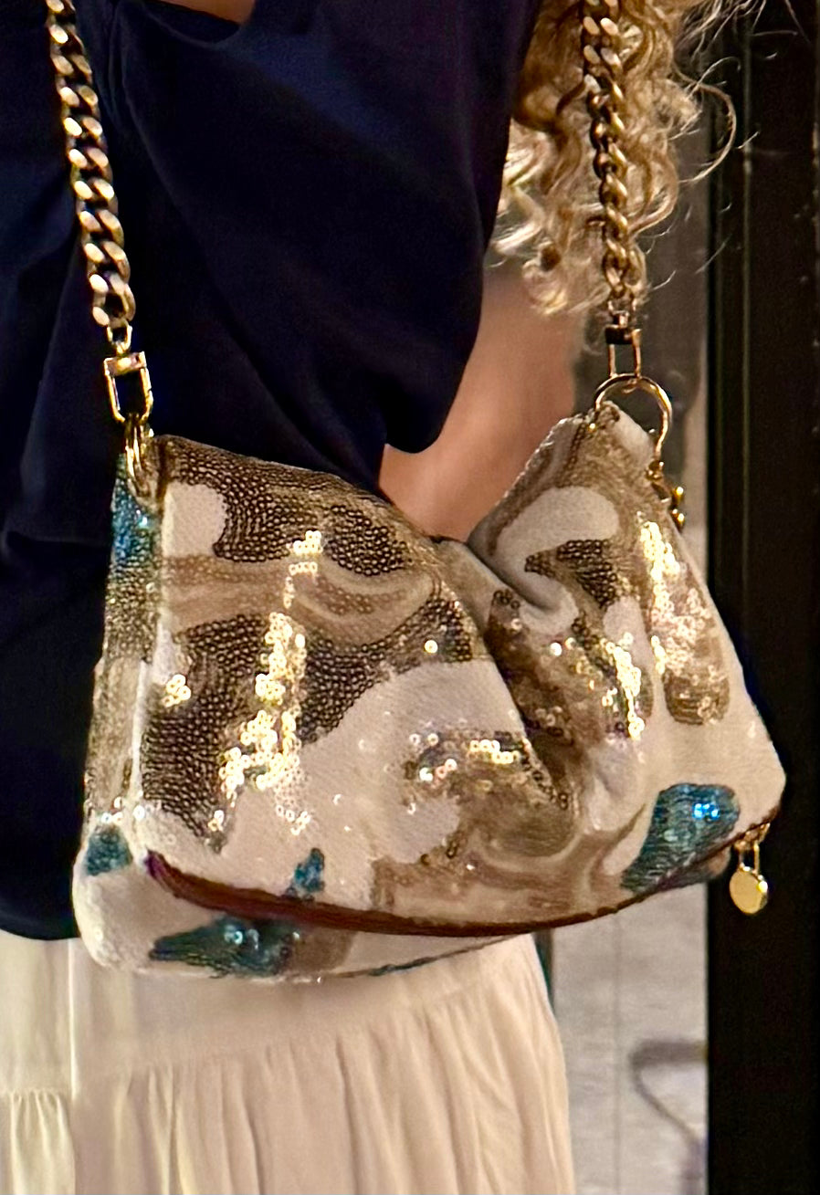 Zippy paillettes bianche, beige e azzurre