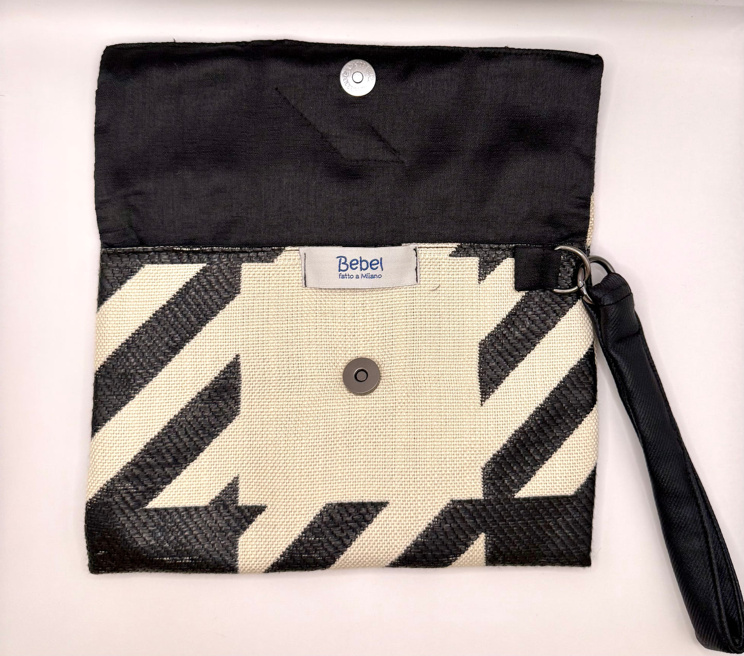 Clutch jacquard a motivo geometrico panna e nero