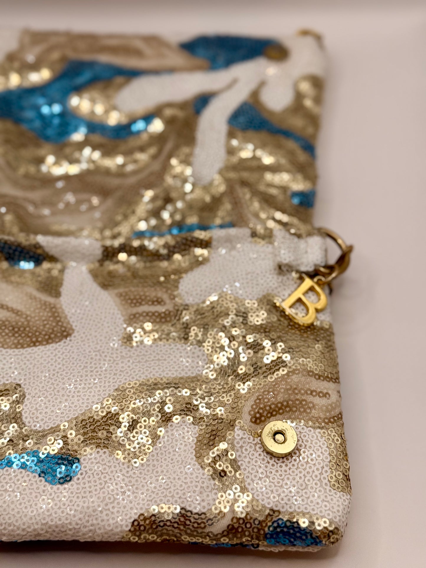 Zippy paillettes bianche, beige e azzurre