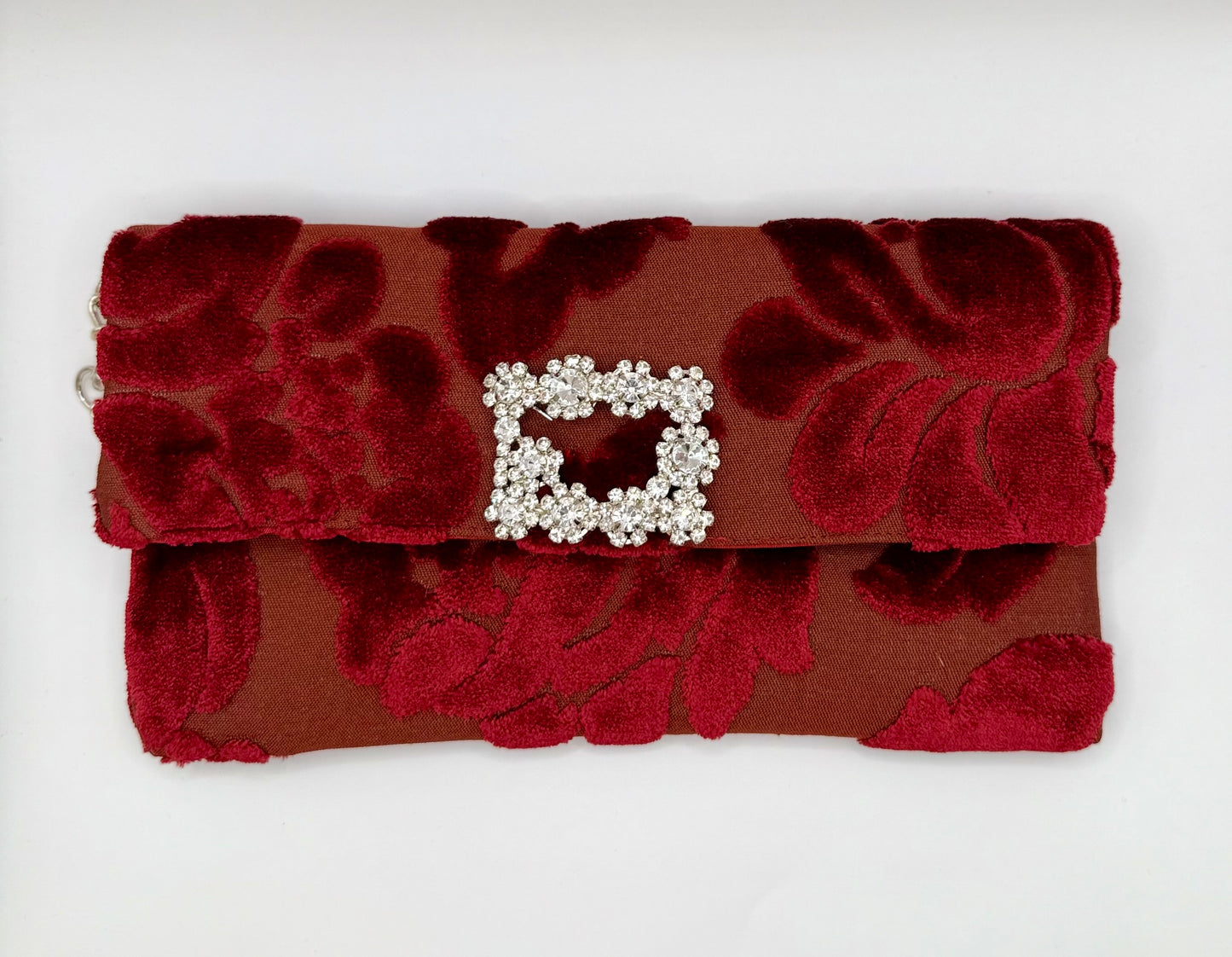 Clutch broccato porpora a fiori con fibbia gioiello