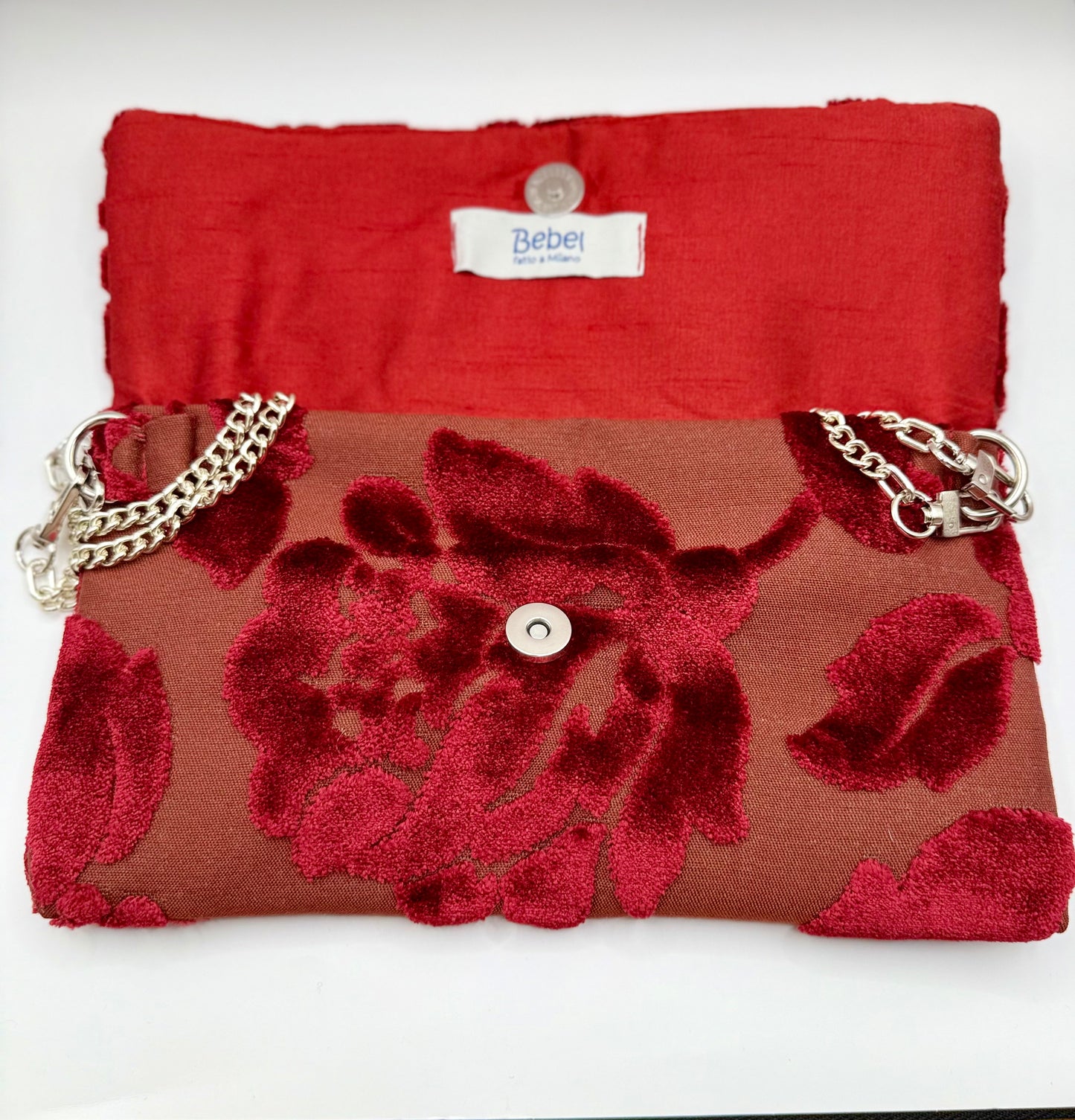 Clutch broccato porpora a fiori con fibbia gioiello