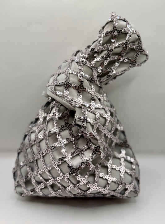 Bond grigio con rete di paillettes argento