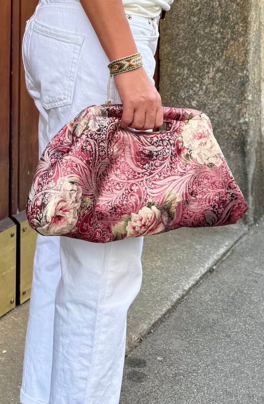 Clutch chiusura a scatto broccato a fiori rosa