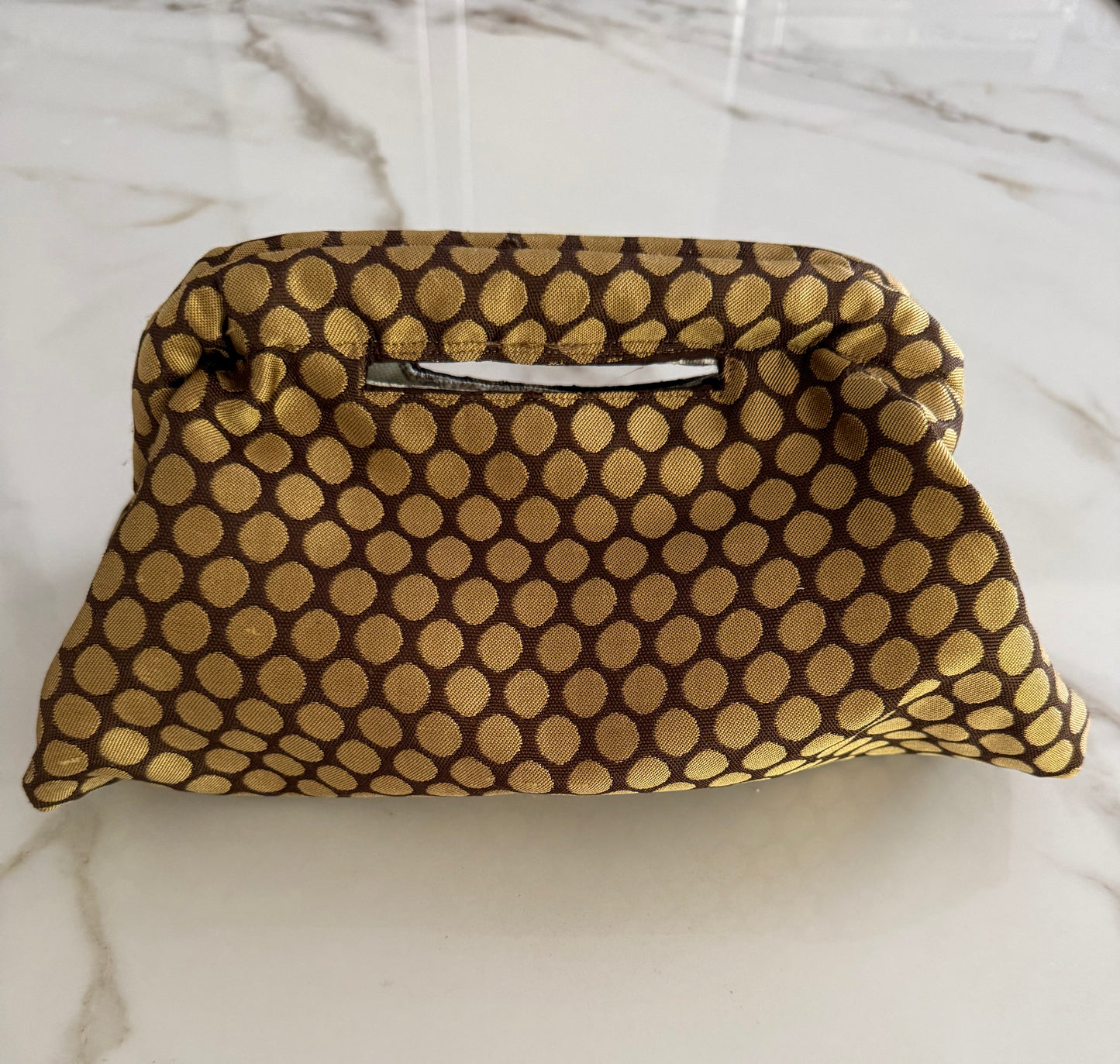 Clutch a pois oro e marrone