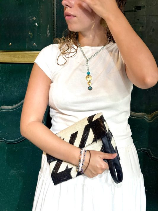 Clutch jacquard a motivo geometrico panna e nero